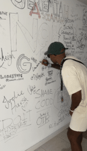 signing ibiza rocks wall